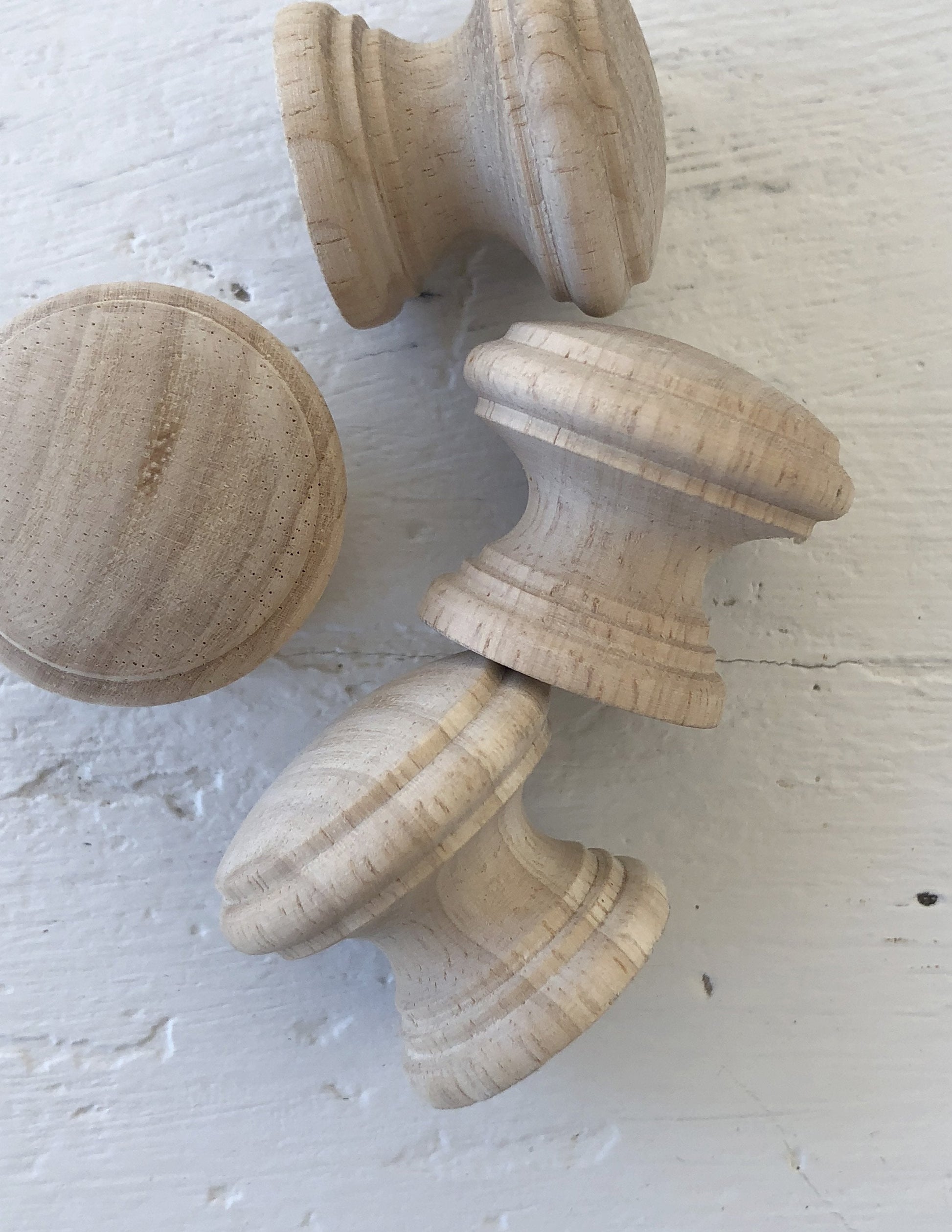 IOD Wooden Knobs 1.50 4 pack IOD hardwood knobs are a little different than the commonly available wooden knobs. Sure, they will work great for that simple pine dresser, but they work equally well on your more sophisticated pieces. Threaded insert and precision screw for easy and accurate mountingElegant profile design for wider applications than most wooden knobsHardwood and subtle grain for best use with paint, stain and all your stamping applications
